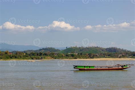 boat ride on the Mekong River with beautiful landscape in Thailand ...