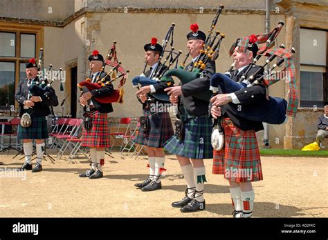 Scottish Bagpipe band at a music festival in the Highlands of Stock ...