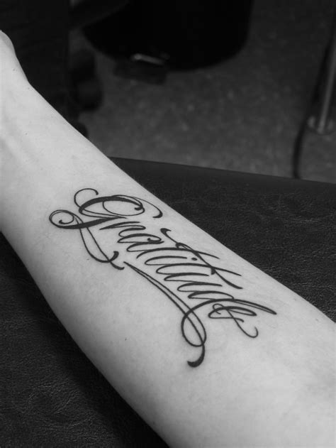 Curled gratitude word tattoo on forearm - Tattooimages.biz