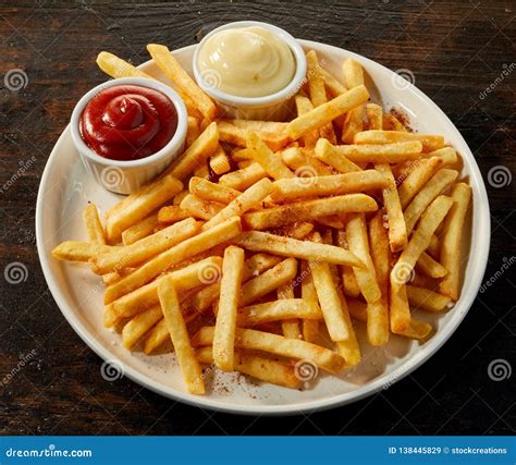 Large Plateful of Crispy French Fries with Dips Stock Image - Image of ...