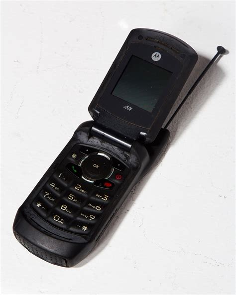 TE050 Motorola Black Flip Cell Phone Prop Rental | ACME Brooklyn