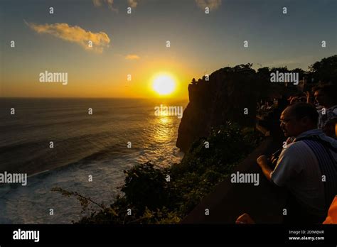 Sunset at Uluwatu Temple at Uluwatu Beach, Bali Stock Photo - Alamy