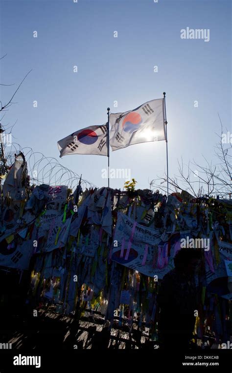 Korean flags over DMZ fence - Imjingak, South Korea Stock Photo - Alamy