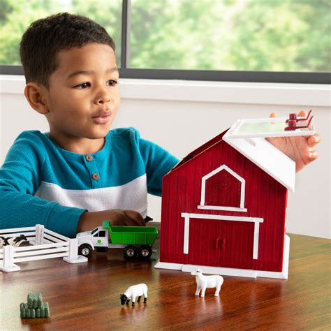 John Deere 1:64 Scale 24 Piece Farm Playset with On-the-Go Barn – Ages 3+