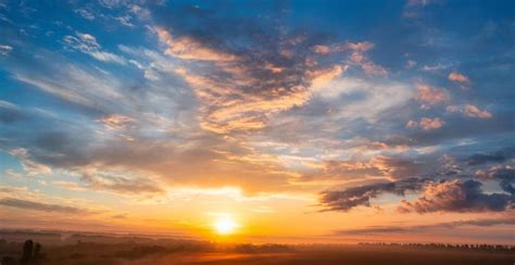 Premium Photo | The dawn sky over the village A wonderful morning landscape