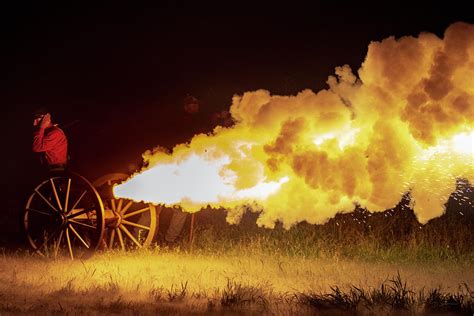 Cannon Firing at Night Photograph by David Sams