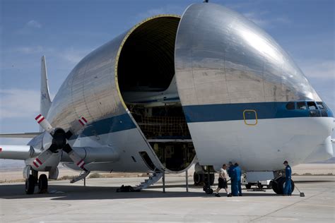 The Super Guppy swallowing a pair of T-38s. : r/aviation