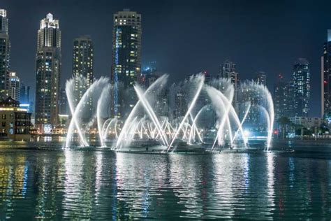 Dubai: Burj Khalifa Fountain Show and Burj Lake Ride | GetYourGuide