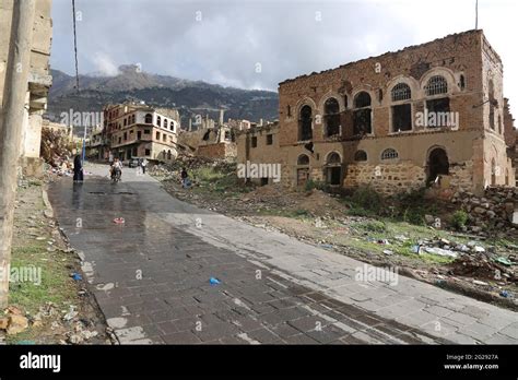 Taiz Yemen 29 Apr 2021 : Yemenis walking on the rubble of houses ...