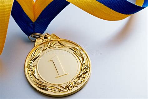 Gold Medal on a Light Background Stock Image - Image of sport, place ...