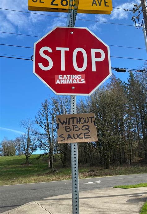 Stop sign graffiti | Odd Stuff Magazine