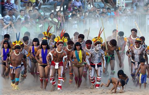 Members of Brazilian indigenous group Kuikuro dance during the XII ...