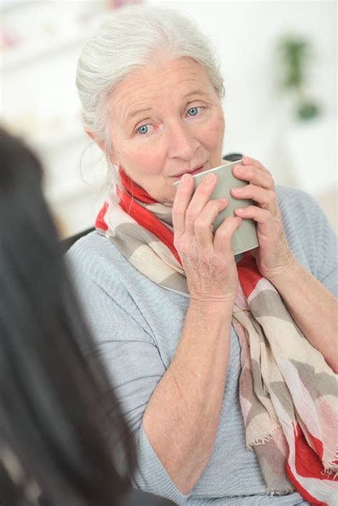 Sad old lady alone stock image. Image of grandmother - 265339041