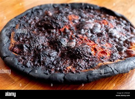 Burnt Pizza Stock Photo - Alamy