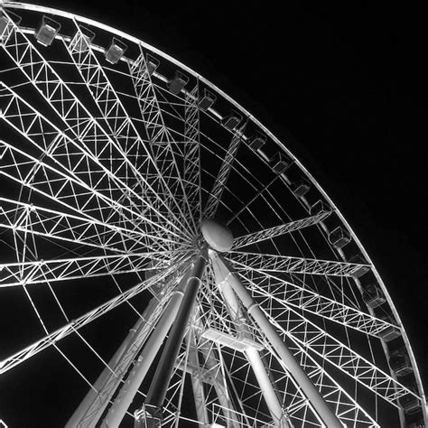 Premium Photo | Low angle view of ferris wheel at night