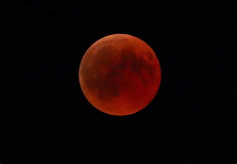 Spectators around the world marvel at rare "blood moon" eclipse - CBS News