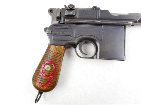 MAUSER , MODEL: C96 BROOMHANDLE RED 9 DATED1920 , CALIBER: 9MM LUGER