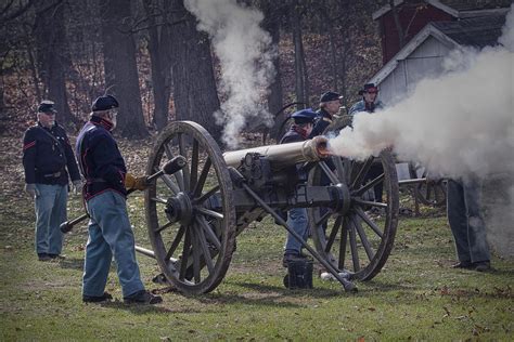 Civil War Reenactors Firing A Cannon Photograph by Randall Nyhof