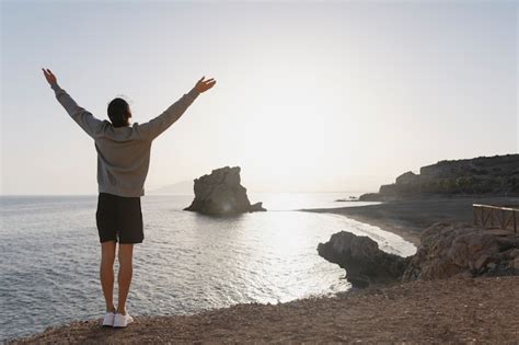 Free Photo | Full shot man alone at the beach