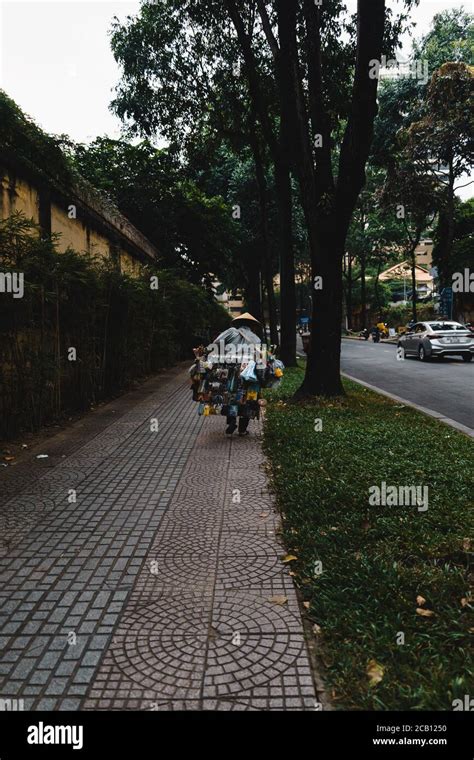 Ho Chi Minh city, Vietnam - 29 July 2020: Vietnamese women wearing Non ...