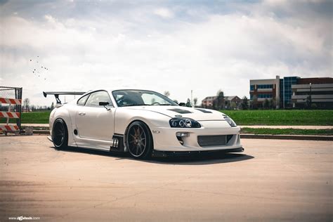 Ultra-Modern Tuning for White Toyota Supra with Custom Blacked Out ...