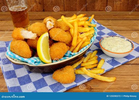 Scampi and French Fries Meal Stock Photo - Image of glass, rustic ...