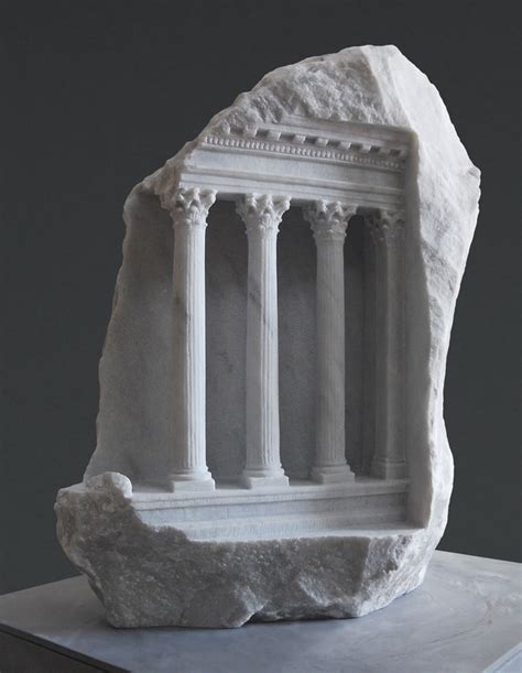 Historic Architectural Structures Intricately Carved into Blocks of Marble