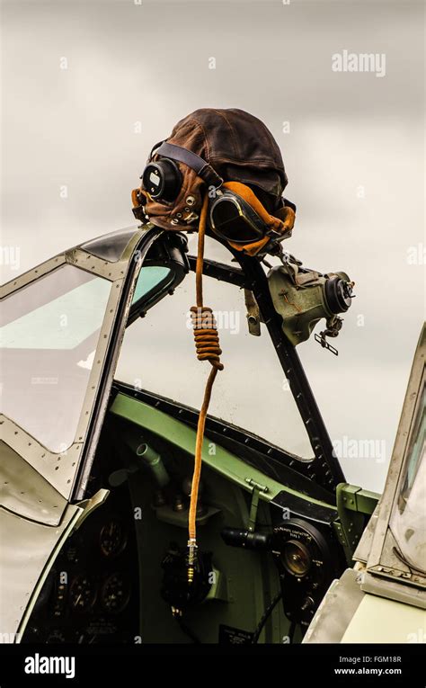 A Spitfire ready to display at an airshow, with cockpit canopy open ...