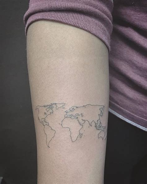 Small world map tattoo on the forearm - Tattoogrid.net