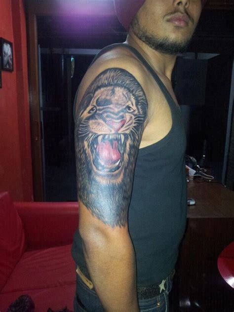 Tattoos Designs, Pictures And Ideas: Angry Lion Head Tattoo On Right ...