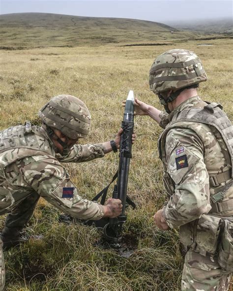 Pictured is a Mortar Team from The Household Division firing their 60mm ...