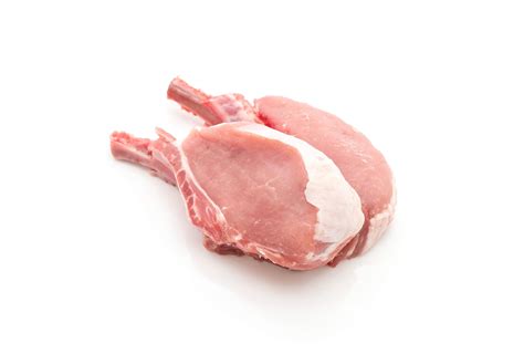 Raw pork chop on white background 1269912 Stock Photo at Vecteezy