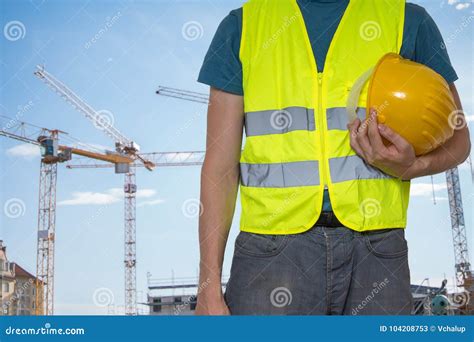 .Worker with Protective Helmet on Construction Site Stock Image - Image ...