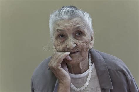 Sad Old Lady Contemplating With Walking Stick Stock Photo - Image of ...