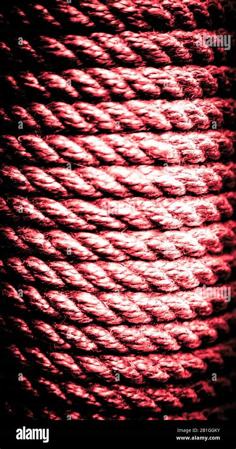 Vertical old red rope background. Rope texture. Close-up rope texture ...