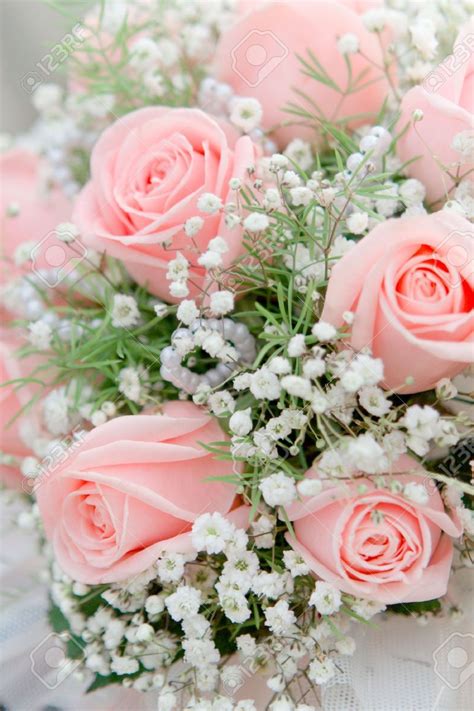 Wedding bouquet from pink roses close up | Pink roses, Pink flowers ...