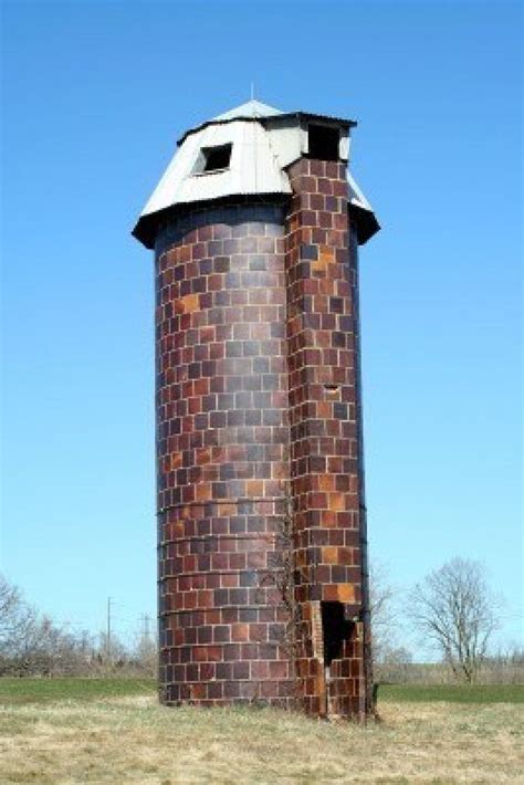 A old silo against blue | Barn pictures, Silos, Barn photography