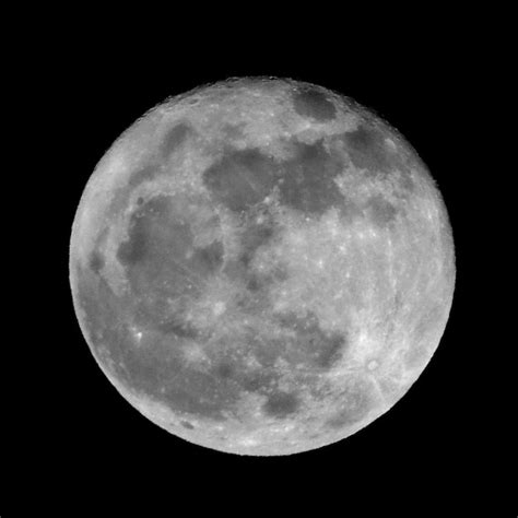 Premium Photo | Low angle view of moon against clear sky at night