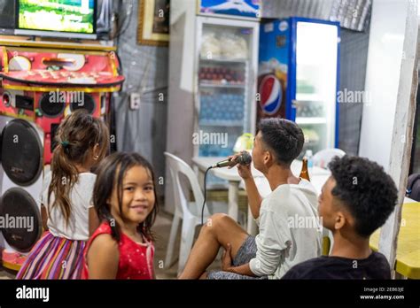 Karaoke at the Philippines, Siargao Island Carinderia Stock Photo - Alamy