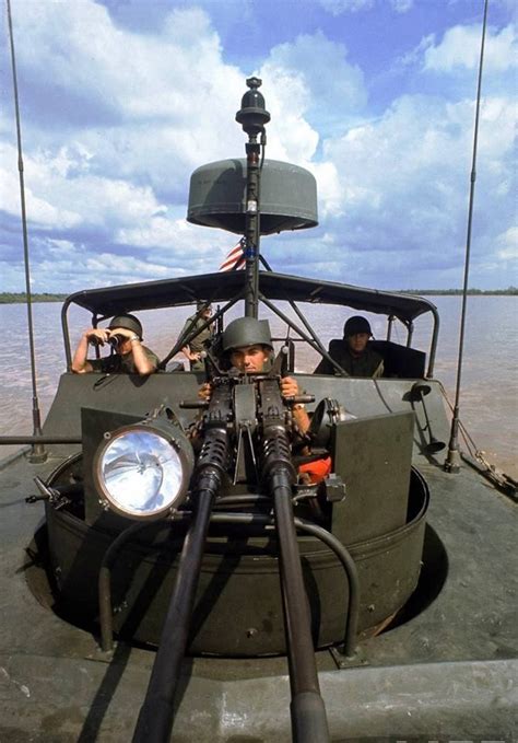 A Usnavy River Patrol Boat Pbr Crewman At The 50 Caliber Machine ...