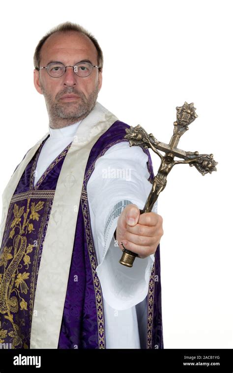 Catholic priest with cross Stock Photo - Alamy