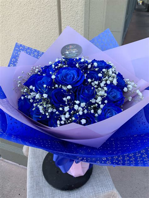 2 Dz. Blue Roses Wrapped Bouquet (PRE-ORDER ONLY) by La Floriya