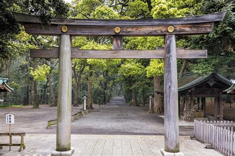 Torii Gate in Meiji Shrine forest in Tokyo, Japan. A torii is a ...