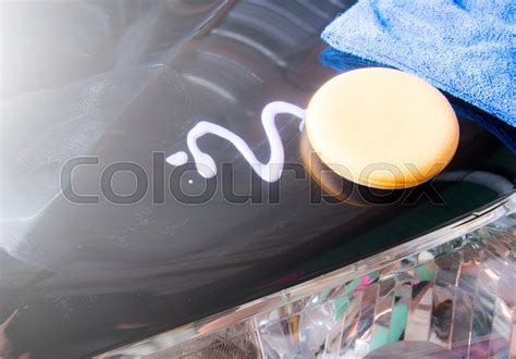 Waxing process,polishing the car | Stock image | Colourbox