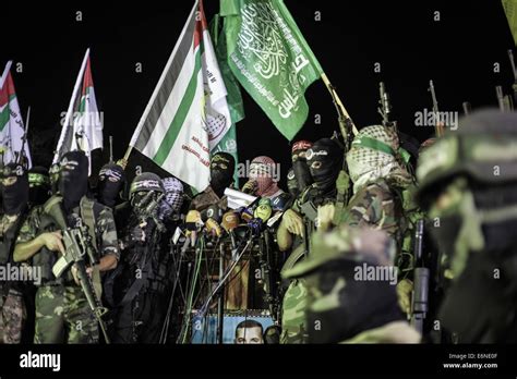 Abu Ubaida speaks in front of Palestinians fighters. Abu Ubaida the ...