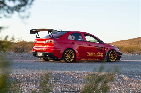 Wild Racer Mitsubishi Evolution on Custom Wheels — CARiD.com Gallery