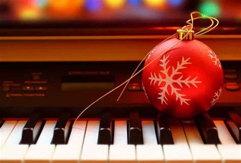 Christmas ball on piano keys concert music holiday - South Florida on ...