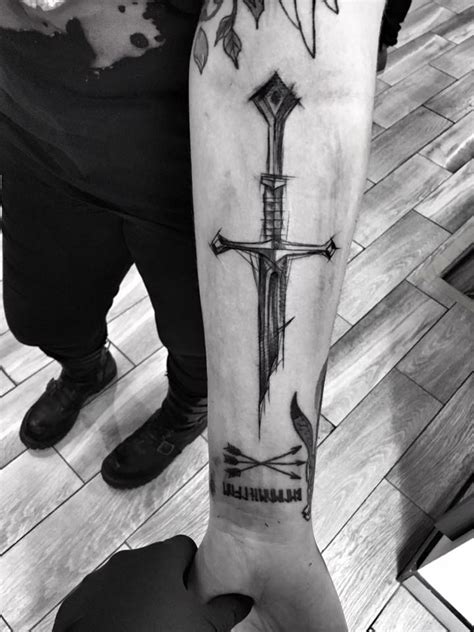 Fantasy style black ink painted by Inez Janiak forearm tattoo of broken ...