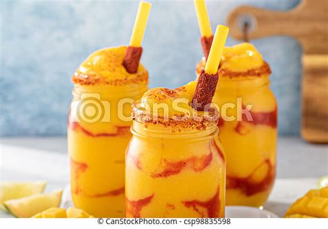 Mangonada mexican mango smoothie with chamoy sauce and lime seasoning ...