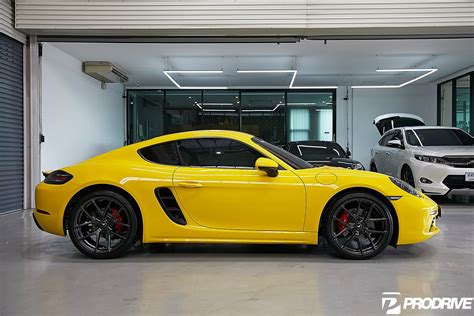 Hyper active Tuned Yellow Porsche Cayman — CARiD.com Gallery